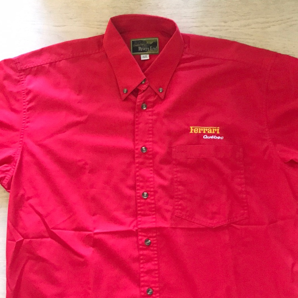 Ferrari Quebec short sleeve shirt. Used once at F1 event . Size is a Large .